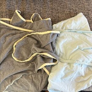 Two “miracle me” infant swaddles